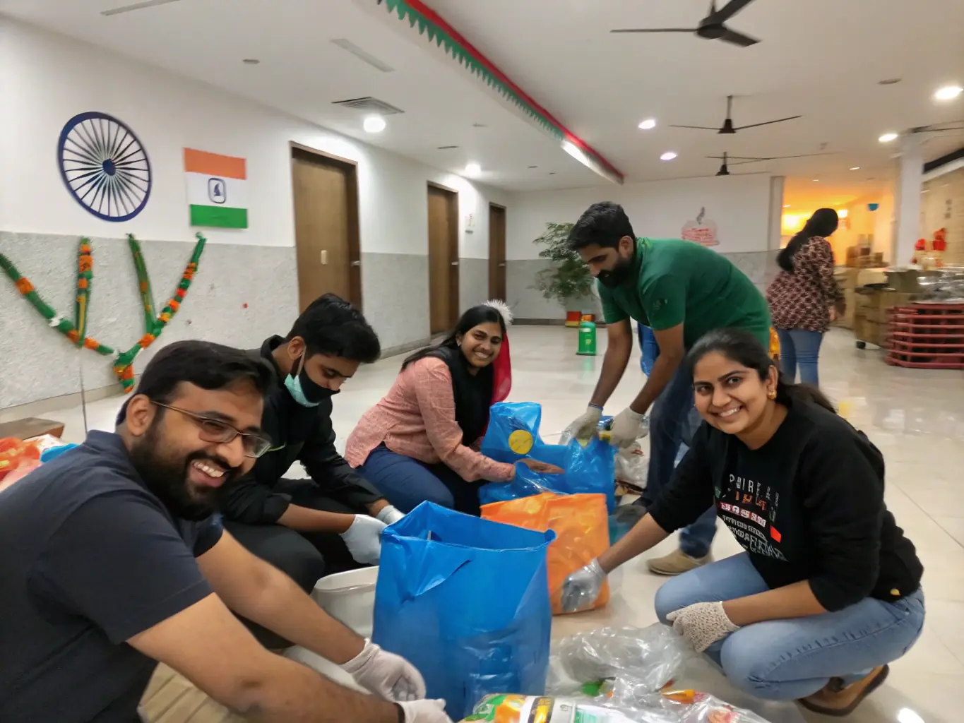 A photo of community members collaborating on a SECOND DEGRE project, such as designing stage decorations or volunteering at an event.